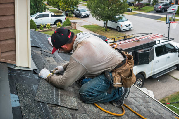 Professional Roof Repair technician working in Plainville, NY